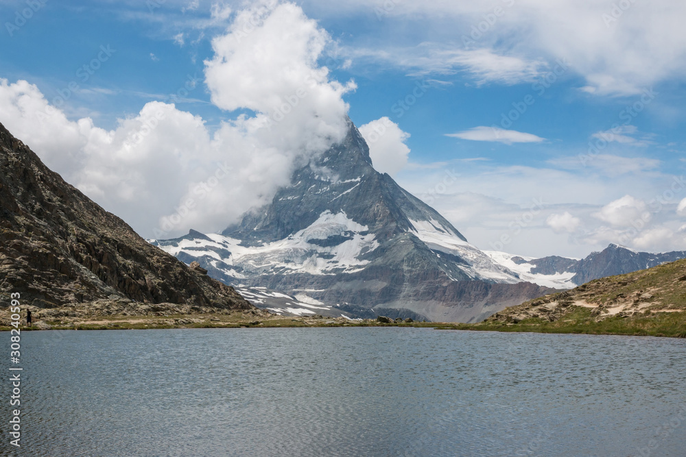 Panorama of Riffelsee lake and Matterhorn mountain in national park Zermatt