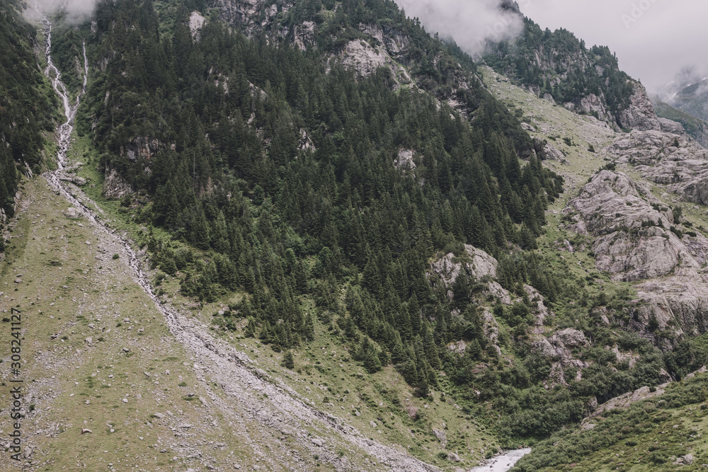 Closeup mountains scenes, walk to Trift Bridge in national park Switzerland