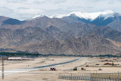 Ladakh, India - Jul 09 2019 - Leh airport (Kushok Bakula Rimpochee Airport) view from Spituk Monastery in Ladakh, Jammu and Kashmir, India. photo