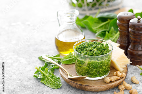 Spinach pesto sauce with cashew, parmesan cheese and olive oil