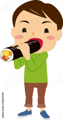 恵方巻きを食べる男の子