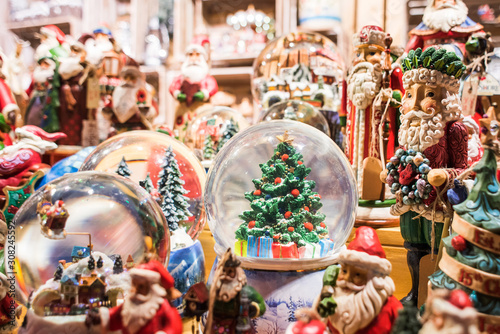 Sales of Christmas decorations on the traditional Christmas market in Europe © kite_rin