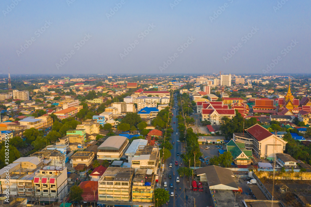 Fototapeta Aerial view of residential buildings in Phra Prathom Chedi district, Nakhon Pathom, Thailand. Urban city in Asia. Architecture landscape background.
