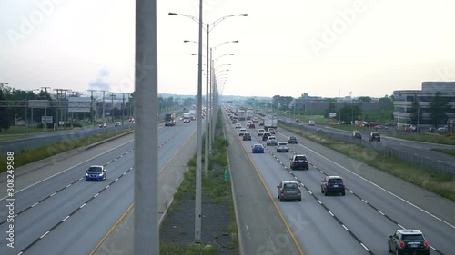 MONTREAL, CANADA - AUGUST 2017: Smooth & steady shot of modern Canadian highway during the morning in the western side of the island