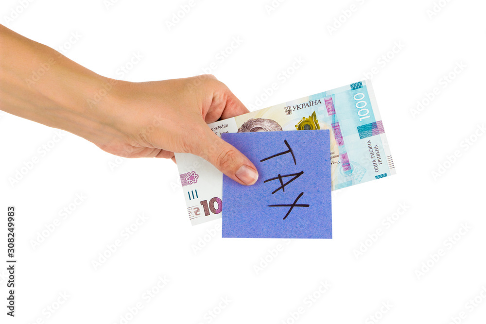 Thousand hryvnias and sticker with different financial signs and symbols in the hand, isolated Thousand hryvnias and sticker with different financial signs and symbols in the hand, isolated