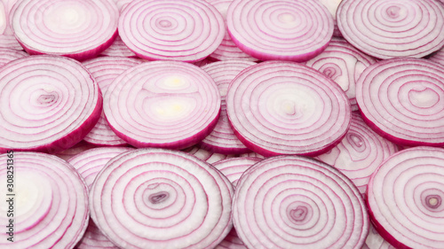 Onion slices as a background. Top view.