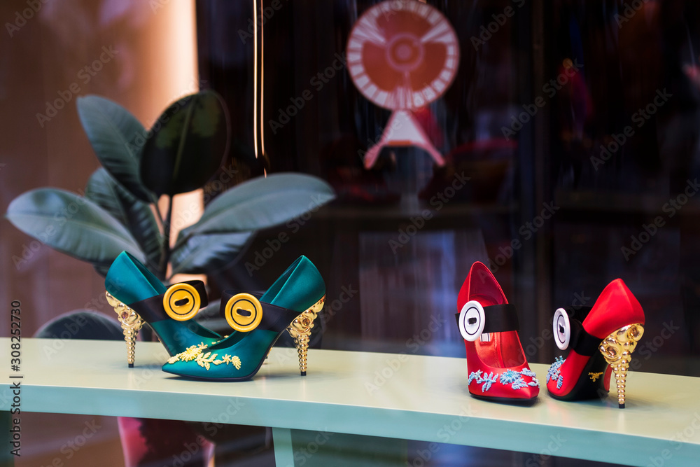 Milan, Italy - September Luxury shoes in a store in Milan. Stock | Adobe Stock