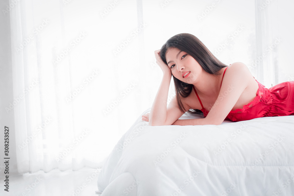 Beautiful asian woman on bed background textures concept. Beautiful asian woman on bed background textures concept.