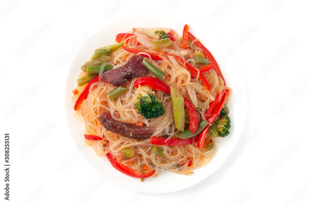 Glass noodles with beef, onions, green beans, paprika, broccoli, sweet and sour sauce, cucumber. On a white plate. White background. Isolate View from above. Glass noodles with beef, onions, green beans, paprika, broccoli, sweet and sour sauce, cucumber. On a white plate. White background. Isolate View from above.
