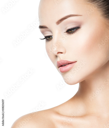 Beautiful face of young woman with health fresh skin