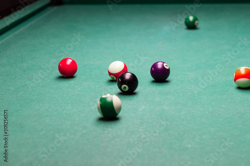 billiard balls breaking from the impact.the game of pool.the competition