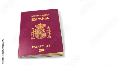 New spanish official passport for Spain. Personal security legal identification for the border for the trip. White background photo