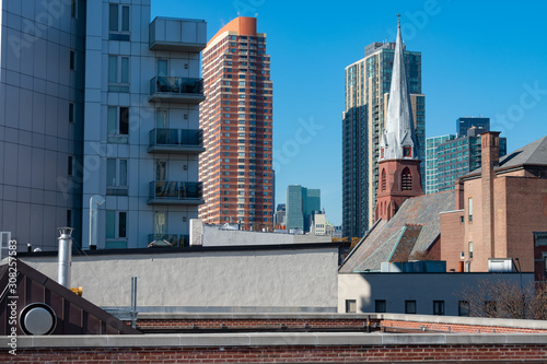 Long Island City Queens New York Rooftop and Skyline scene with a Church Steeple