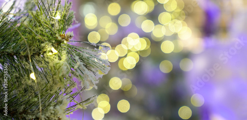 Abstract light bokeh with christmas tree