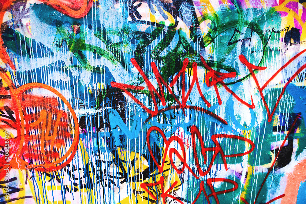 Closeup of damaged colorful urban wall texture - obrazy, fototapety, plakaty 