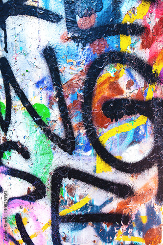 Closeup of damaged colorful urban wall texture