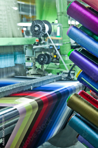 Textile industry with knitting machines in factory - italian - made in Italy