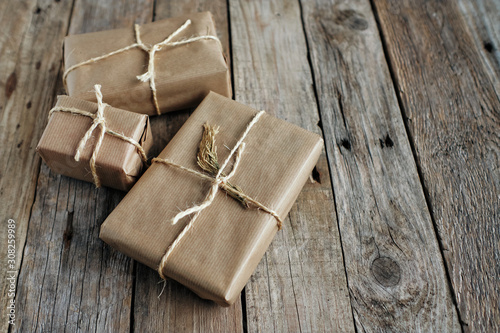 Gift packages wrapped with kraft paper and tied with rope