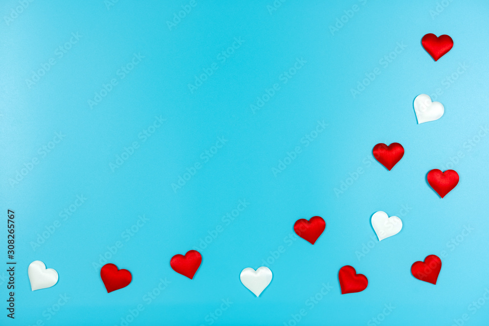 Love and Valentine's day concept., Decoration red hearts and white heart on light blue background with copy space for text.