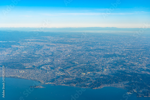Aerial view of Shonan region in sunrise time with blue sky horizon background, Kanagawa Prefecture, Japan
