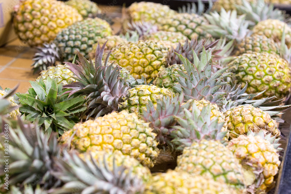 Bunch of pineapples at market