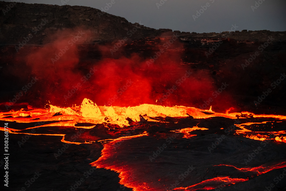 Waves of lava at the surface of Erta Ale lava lake - obrazy, fototapety, plakaty 