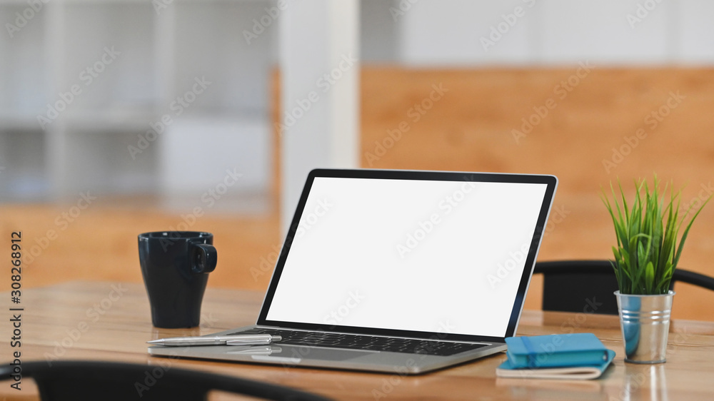 Mockup laptop computer empty screen on wooden table. Mockup laptop computer empty screen on wooden table.