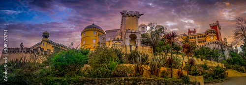 Stunning sunset panorama of Pena Palace in Sintra one of the seven wonders of Portugal photo