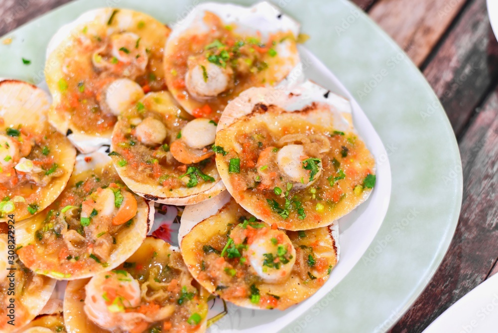 Pile of Grilled Scallops with Sauce Pile of Grilled Scallops with Sauce