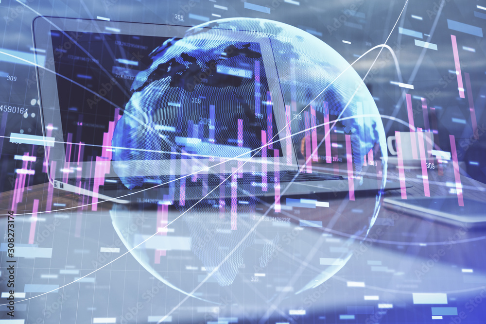 Financial chart drawing and table with computer on background. Double exposure. Concept of international markets. Financial chart drawing and table with computer on background. Double exposure. Concept of international markets.