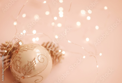 New Year or Christmas background with toys, balls, cones and bokeh.