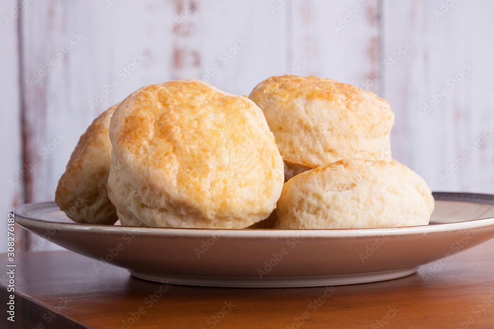 Fototapeta premium Homemade English scones for four o'clock tea in a plate