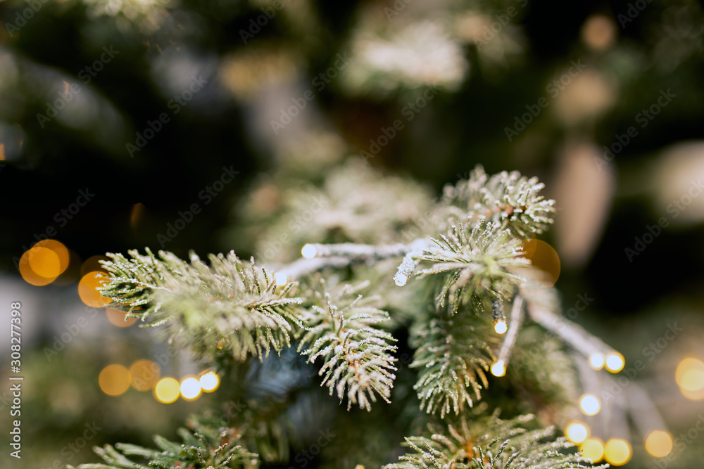 Christmas tree with decoration, lights and snow close-up background texture, Merry Christmas and a Happy New Year, bokeh and blurred colorful concept Christmas tree with decoration, lights and snow close-up background texture, Merry Christmas and a Happy New Year, bokeh and blurred colorful concept