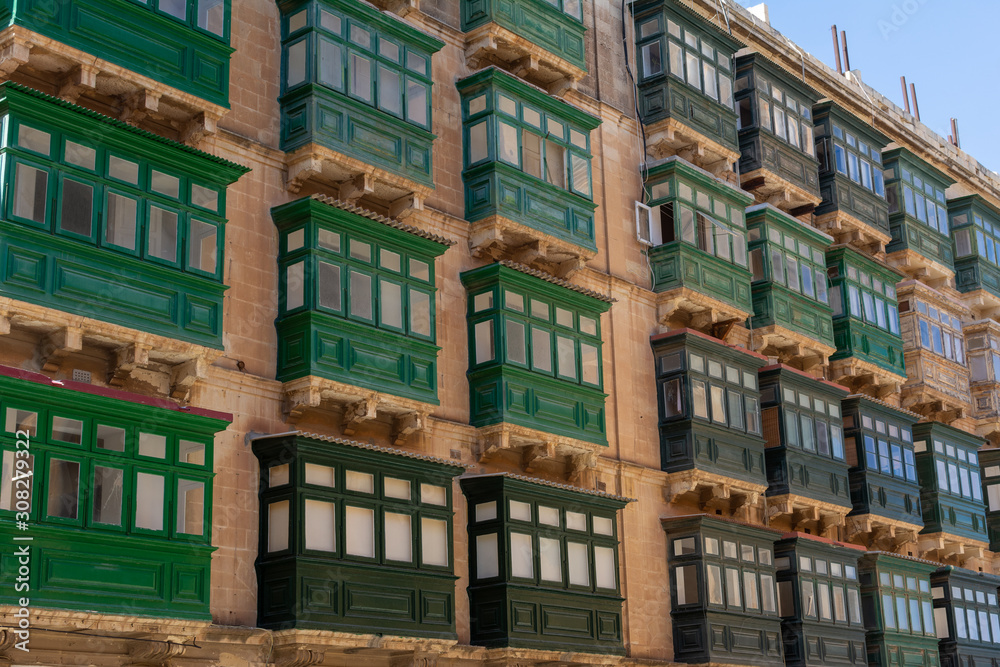 Fototapeta premium Traditional Malta colorful green balconies 