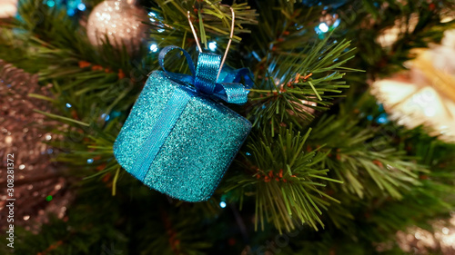 A blue gift box hanging Ideas to welcome the upcoming Christmas season.