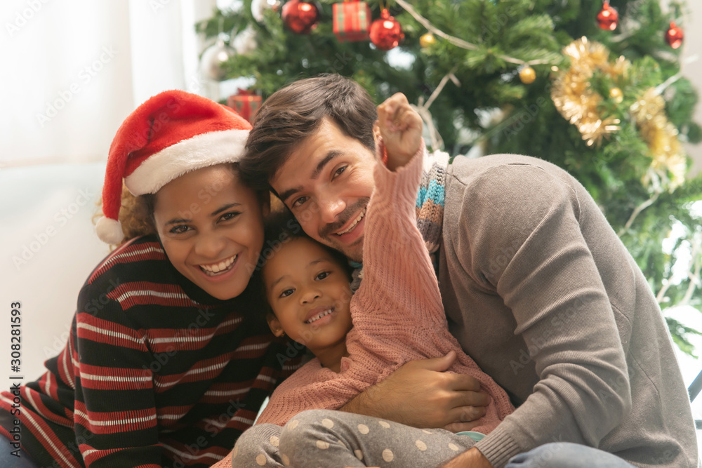 Portrait happy family decorated for Christmas Portrait happy family decorated for Christmas
