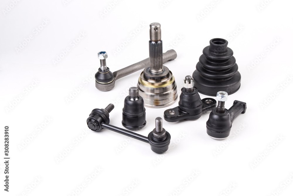 Suspension spare parts for cars isolated on white background. New car parts. Suspension spare parts for cars isolated on white background. New car parts.