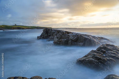 Rocks and sea on a long exposure at Mullaghmore photo