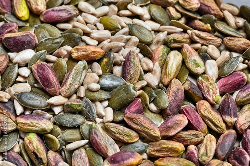 Cashews, pistachio, pumpkin seeds, sunflower seeds in plastic boxes