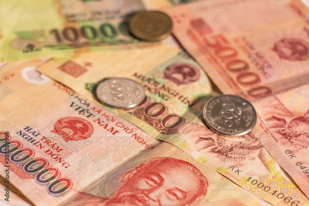 Obraz premium Vietnamese dong VND banknotes and coins