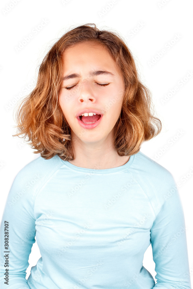 Beautiful young girl with curly hair sings with open mouth. Yawning girl, isolated Beautiful young girl with curly hair sings with open mouth. Yawning girl, isolated