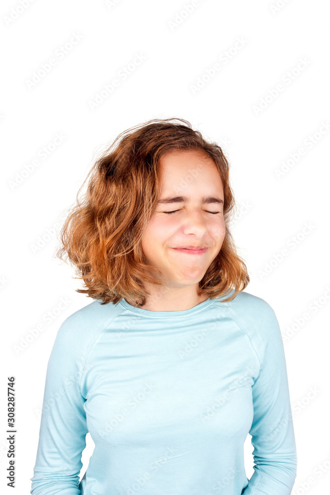 Cute teenager girl with funny face expression looking to camera, isolated. April fool day Cute teenager girl with funny face expression looking to camera, isolated. April fool day