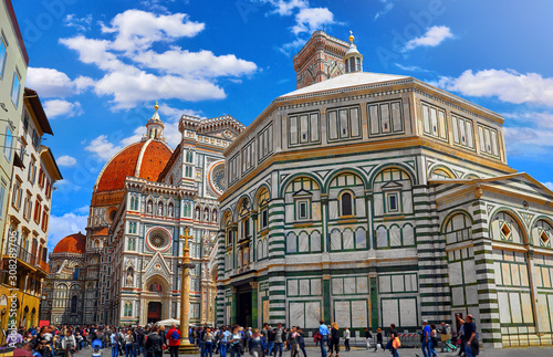 Duomo. Santa Maria del Fiore Cathedral in Florence. Italy. Front side on blue sky background. Sunny day. photo