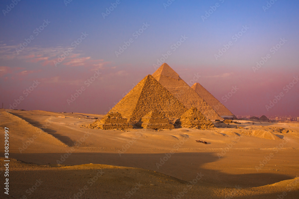 scenic panorama view of giza pyramids cairo egypt  with caravan  - obrazy, fototapety, plakaty 