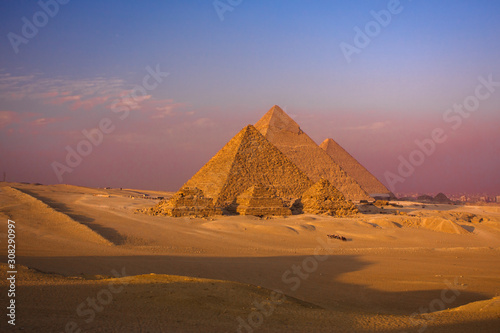 scenic panorama view of giza pyramids cairo egypt with caravan 