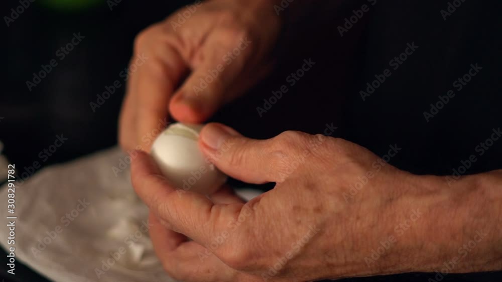 Peeling Hard Boiled Egg in Slow Motion Peeling Hard Boiled Egg in Slow Motion