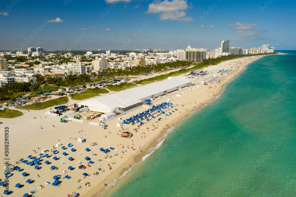Aerial photo Miami Art Basel event tents setup on the sand December 2019