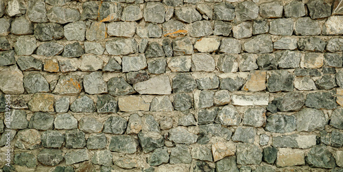 Aged stone wall structure ideal for background and texture