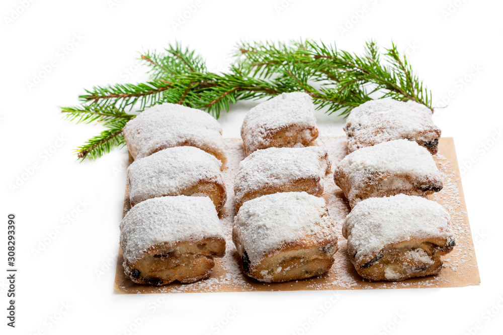 Freshly baked christmas stollen bites isolated on white Freshly baked christmas stollen bites isolated on white