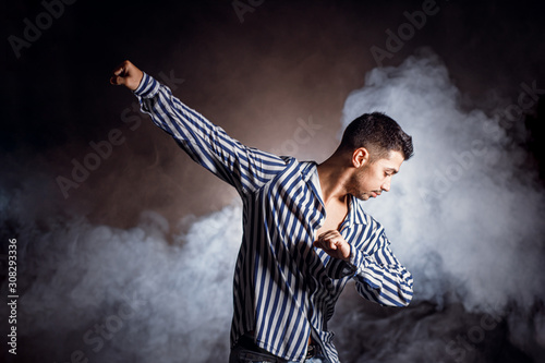 portrait of dancer man in movement, athletic man during dance isolated